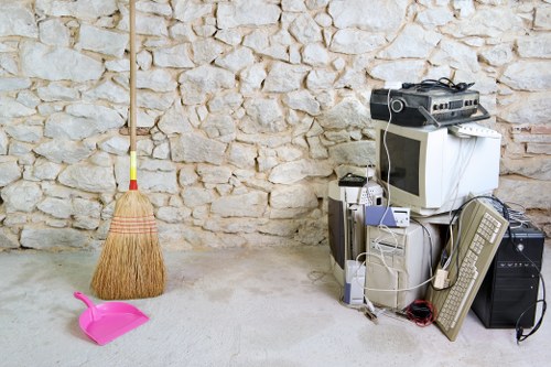 Professionals performing loft clearance in a Victorian home