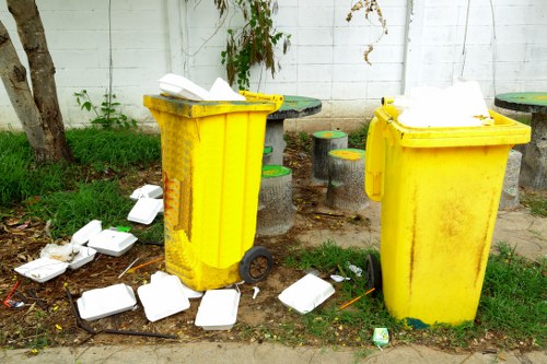 Recycling bins and donated items after loft clearance